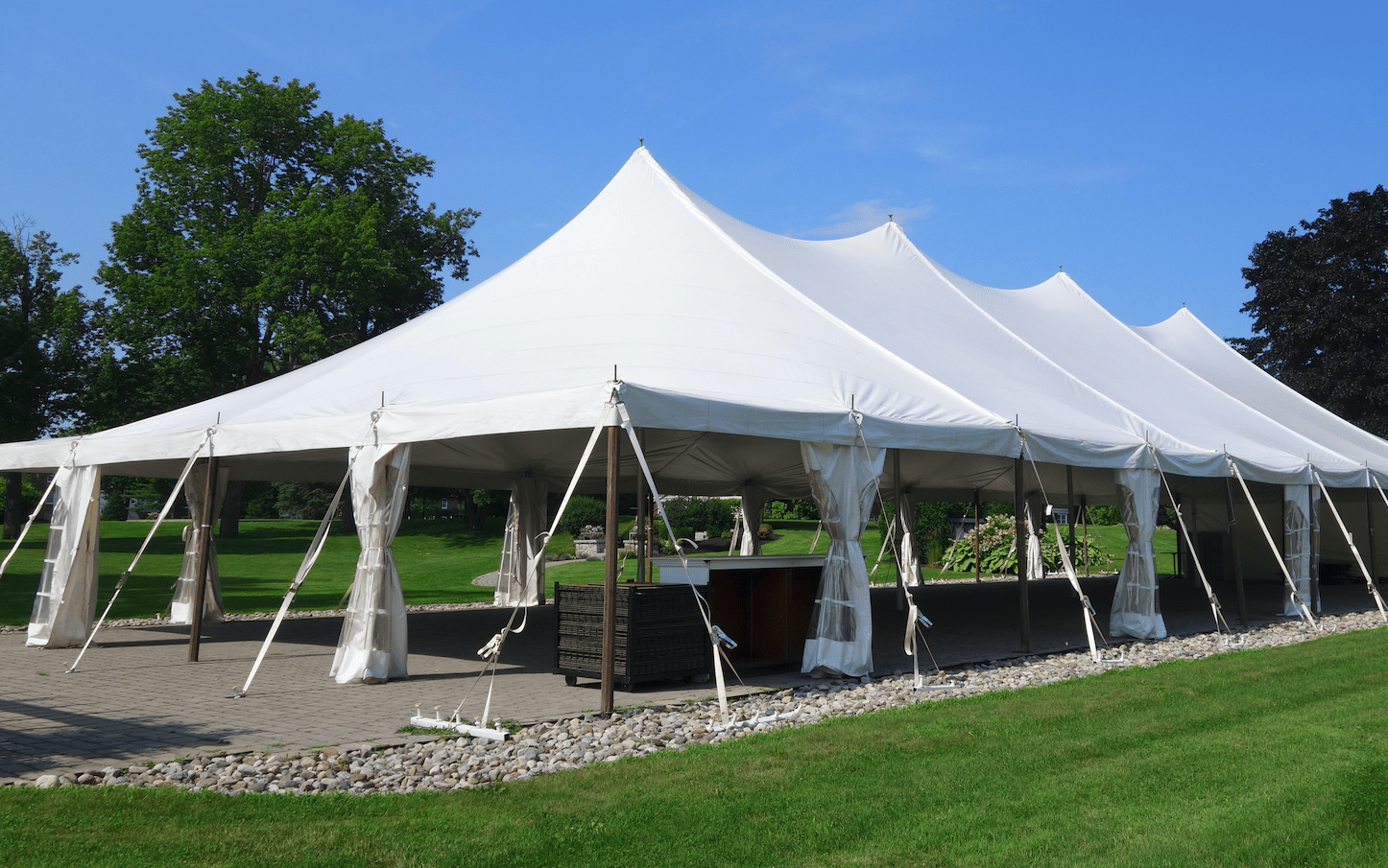 Event tent setup for an outdoor reception in Bristow, VA